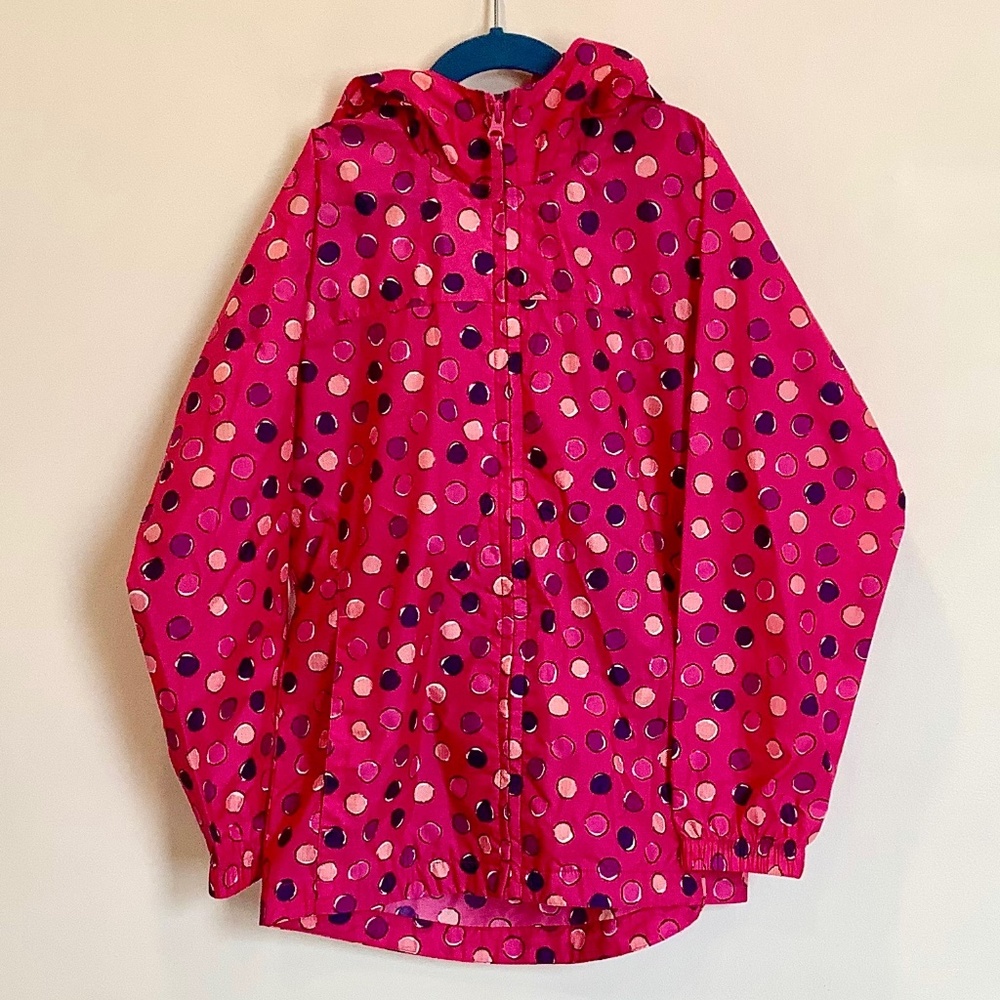 Girl’s dotty rain jacket